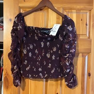 Elegant Floral Smocked Blouse with Sheer Sleeves